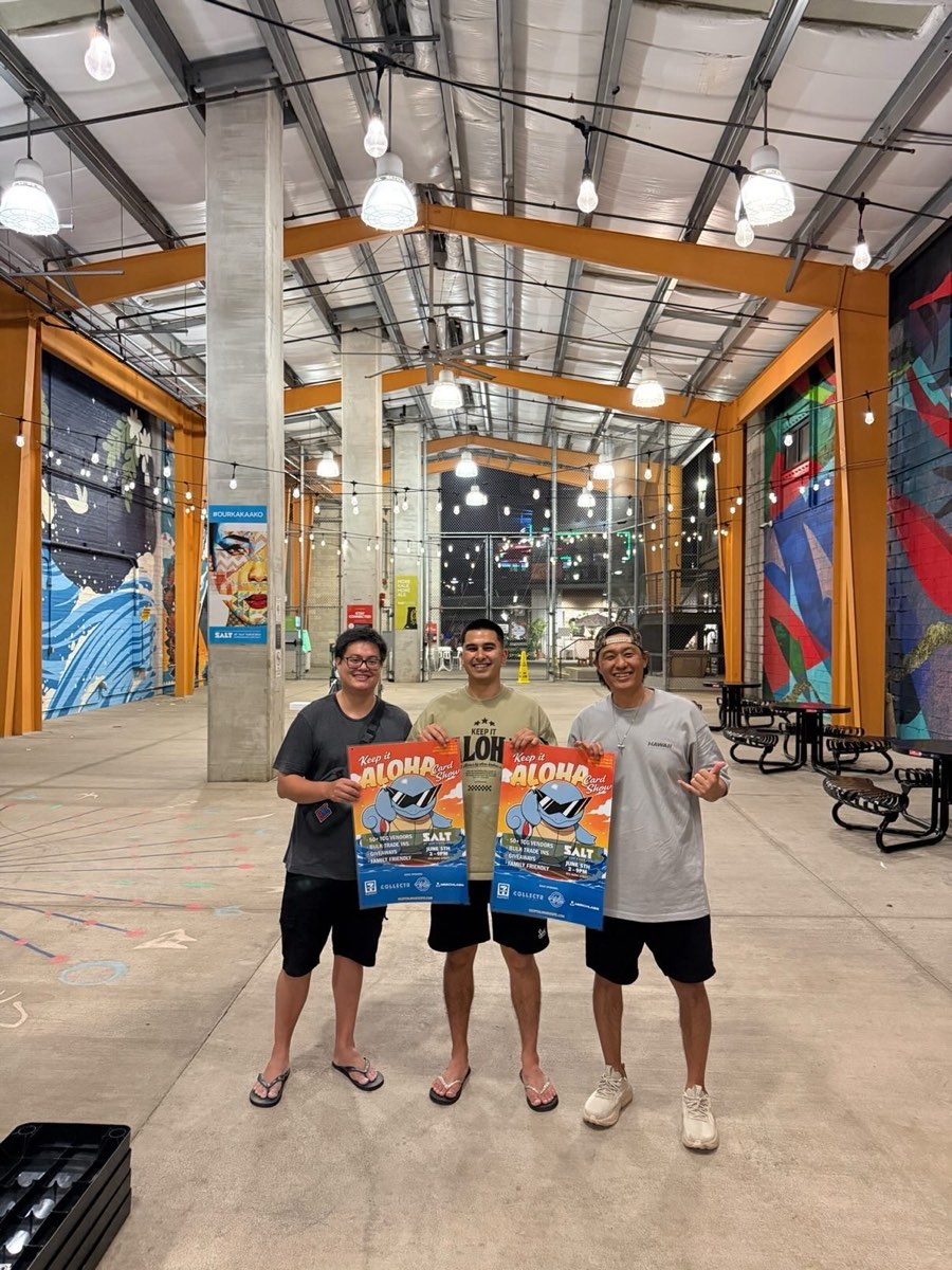 The Keep It Aloha team holding up the show posters at SALT Kaka'ako