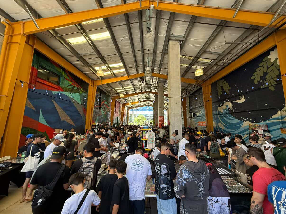 Keep It Aloha Card Show — packed show floor under the colorful awnings at SALT at Our Kakaako