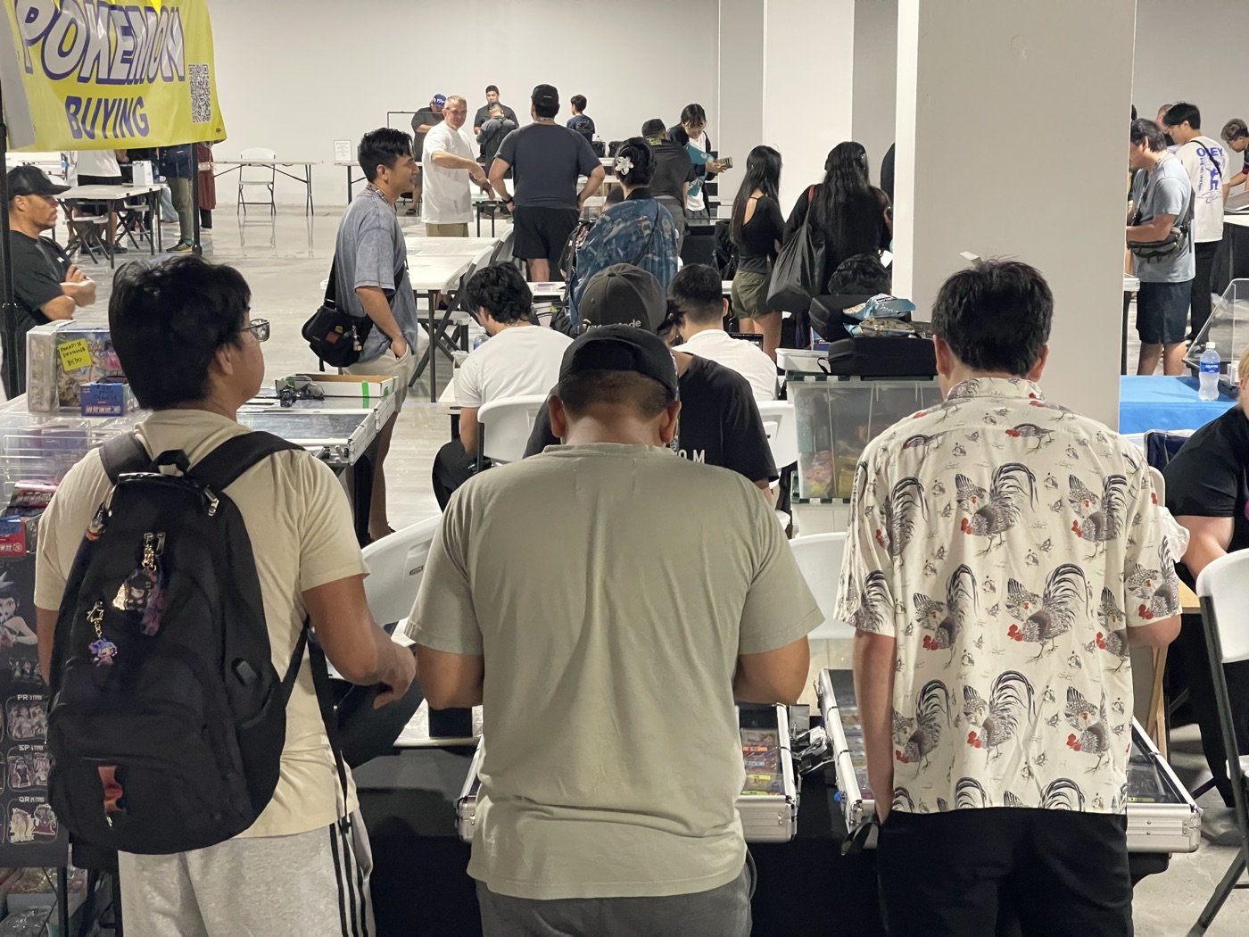 Collectors browsing the vendor floor at the Space 62 Collectibles Show, Ala Moana Center