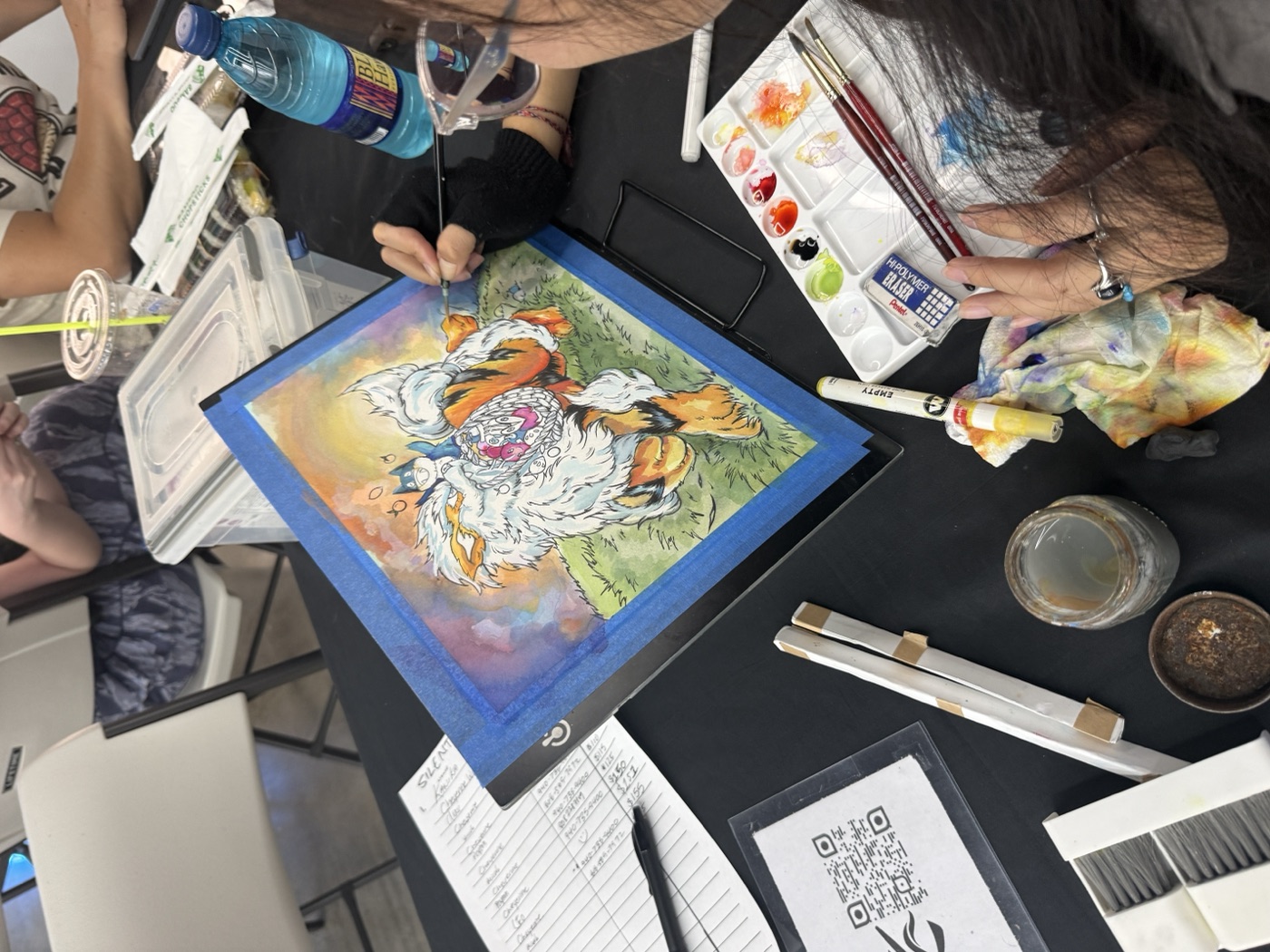 Local artist Anh Vu drawing live at the Space 62 Collectibles Show